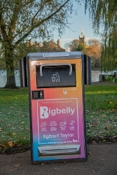 Solar compacting bin