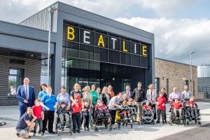 Pupils, staff and guests outside the new Beatlie Campus