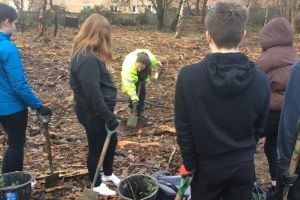 Pupils at Inveralmond planting trees with Woodland Trust