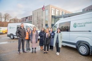 Council staff with the new electric vans