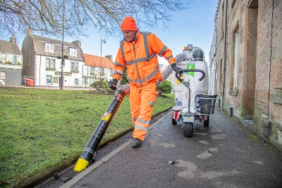 Council staff member with Glutton in action