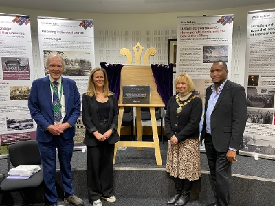 Council Leader Lawrence Fitzpatrick, Head of Corporate Service Lesley Henderson, Provost Cathy Muldoon and Silence Chihuri, co-chair of the West Lothian Legacy of Chattel Slavery Working with the plaque dedicated to Scotland's first Black MP Peter McLagan