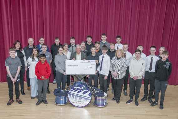 Highland Games donation to support Schools Pipe Band